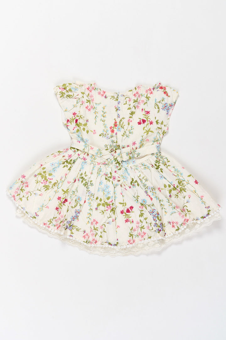 The Nesavu Girls Cotton Frock Graceful Floral Girls Frock with Delicate Lace Detailing – Perfect for Weddings and Parties Nesavu Nesavu Floral Girls Frock Lace Trim Elegant Design  Perfect Weddings Festive Events