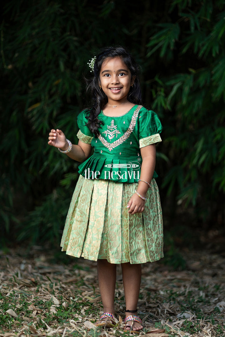 The Nesavu Silk Party Frock Green and Gold Banarasi Semi-Silk Dress for Girls - Perfect for Onam and Navratri Nesavu Green and Gold Banarasi Semi-Silk Dress for Girls - Onam and Navratri