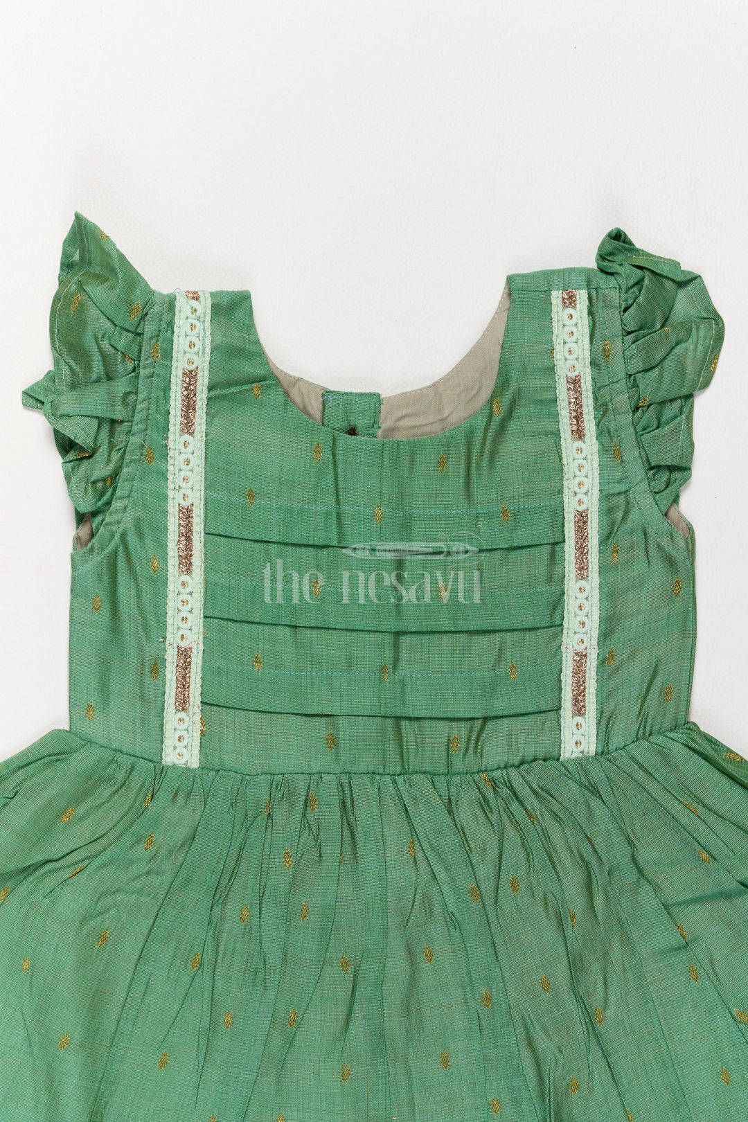 The Nesavu Girls Cotton Frock Green Chanderi Cotton Midi Frock for Girls with Lace Accents Stylish Festive Wear Nesavu Nesavu Green Chanderi Cotton Midi Frock Girls Pleats Lace Details