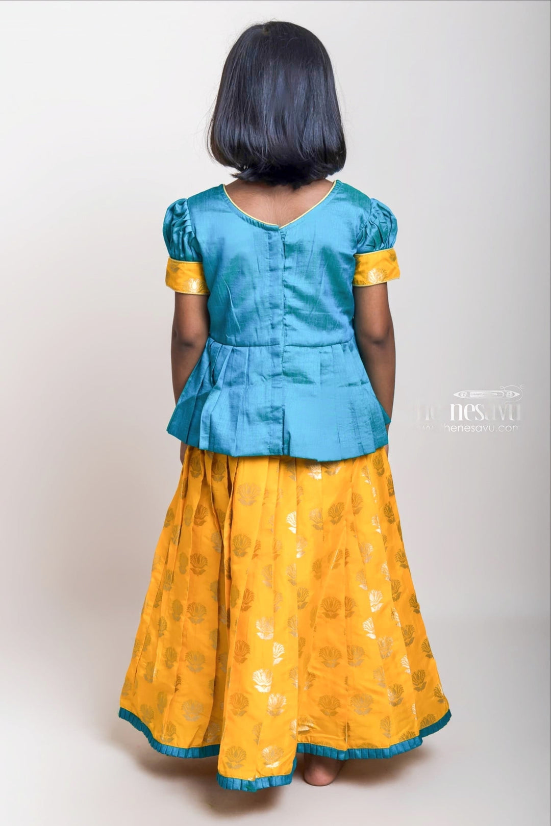 The Nesavu Pattu Pavadai Green Pleated Peplum Blouse And Brocade Printed Yellow Silk Skirt For Girls Nesavu Green And Yellow Pattu Pavadai| Festive Wear Collection 2023| The Nesavu