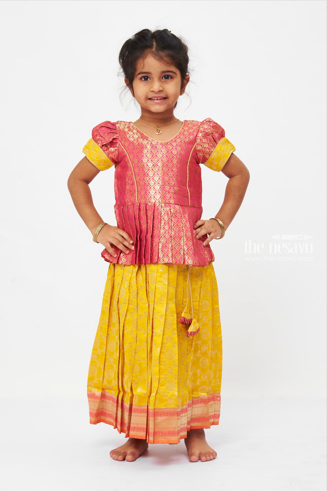 The Nesavu Pattu Pavadai Langa Brocade Peplum Blouse paired with Banarasi Pattu Pavadai Chattai - Traditional Silk Dress for Girls Nesavu 14 (6M) / Yellow / Silk Blend GPP310B-14 Traditional Girls Pavadai Sattai | Langa Voni Pattu Pavadai For Girls | The Nesavu