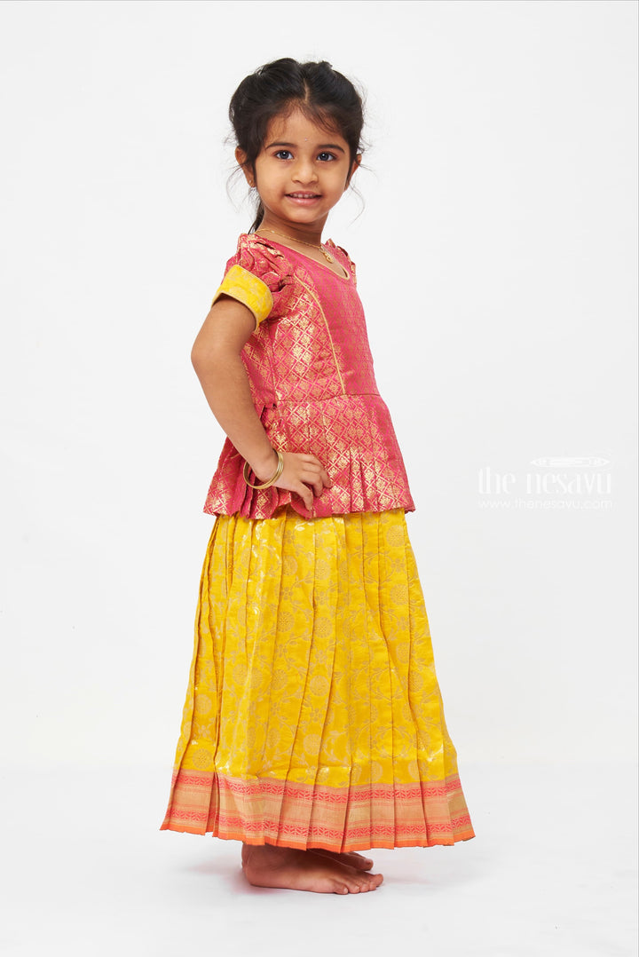 The Nesavu Pattu Pavadai Langa Brocade Peplum Blouse paired with Banarasi Pattu Pavadai Chattai - Traditional Silk Dress for Girls Nesavu Traditional Girls Pavadai Sattai | Langa Voni Pattu Pavadai For Girls | The Nesavu