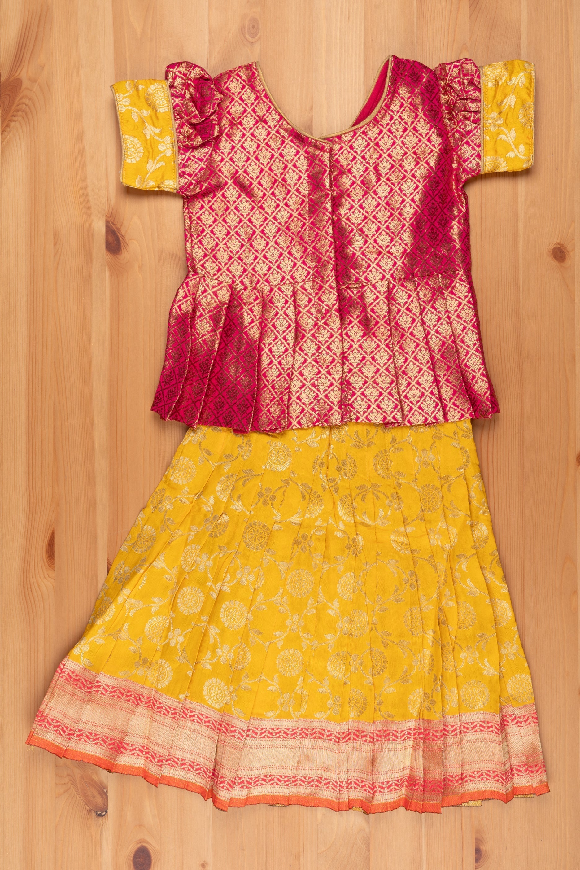 nesavu langa brocade peplum blouse paired with banarasi pattu pavadai chattai traditional silk dress for girls pattu pavadai thenesavu traditional girls pavadai sattai langa voni patt 54b1c82b 4601 486f b337 f86a2fd450b6