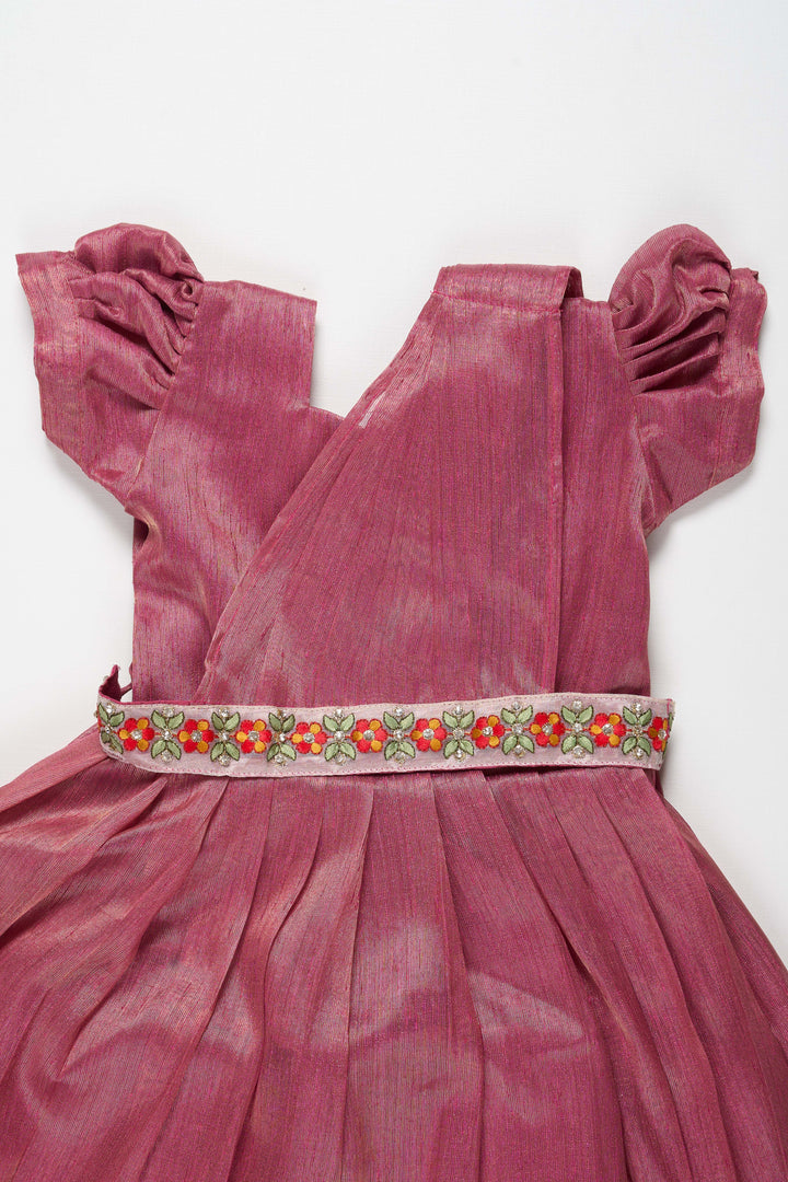 The Nesavu Girls Silk Gown Magenta Tissue Fabric Saree Gown for Girls with Embroidered Hip Belt Nesavu