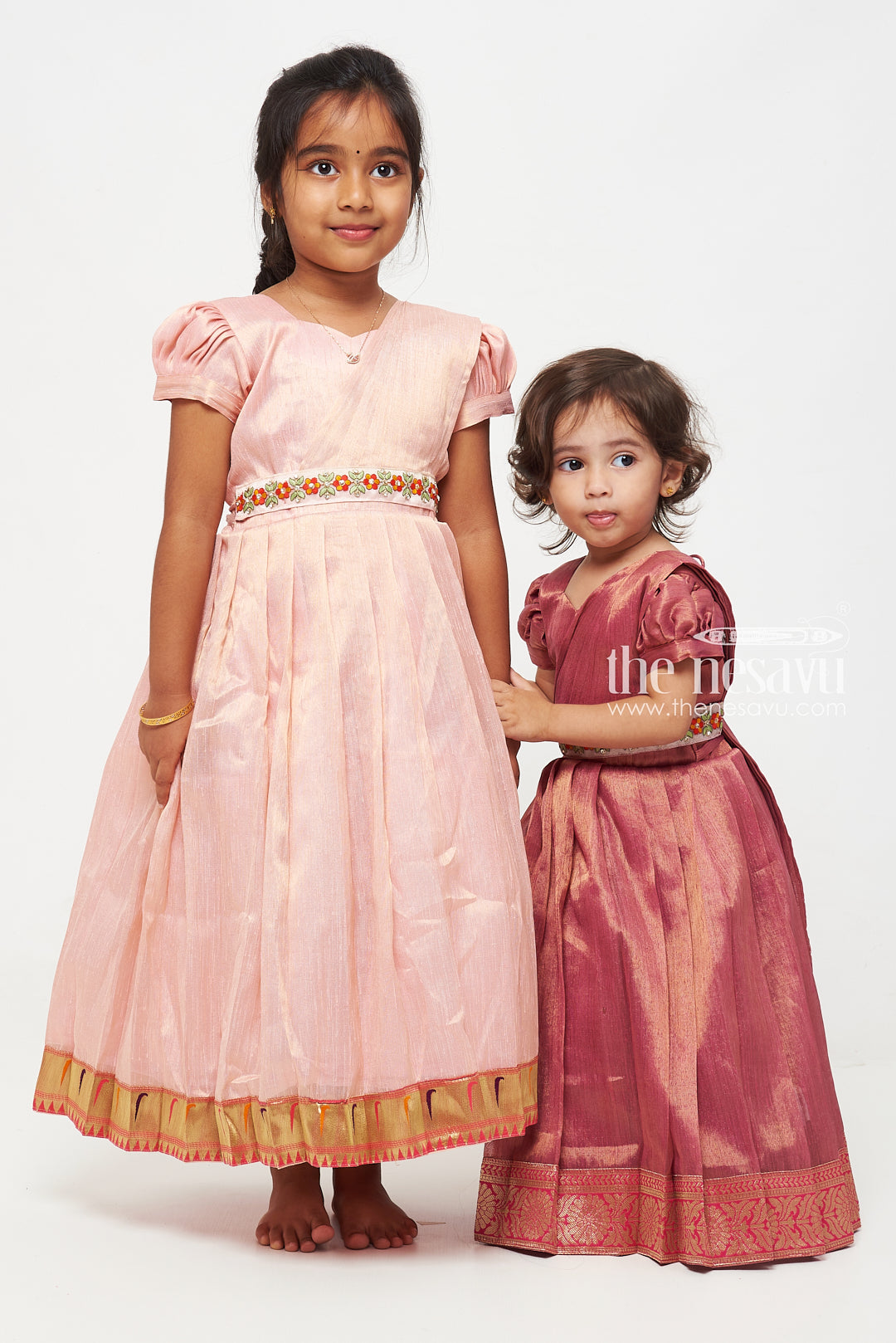 The Nesavu Girls Silk Gown Magenta Tissue Fabric Saree Gown for Girls with Embroidered Hip Belt Nesavu