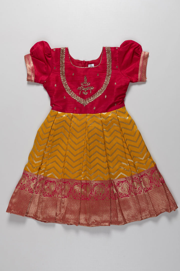 The Nesavu Silk Party Frock Majestic Maroon and Yellow Pattu Silk Frock: Intricate Gold Embroidery with Chevron for Girls Nesavu 16 (1Y) / Yellow / Silk Blend SF788A-16 Maroon and Yellow Pattu Silk Frock | Chevron Pattern & Banarasi Border | Traditional Festive Wear for Girls | The Nesavu