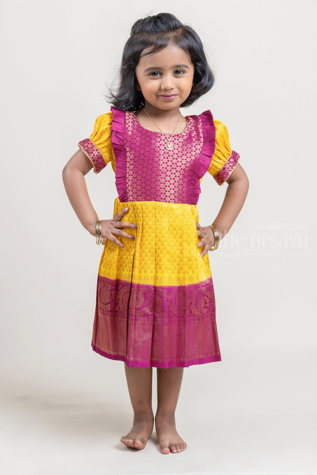 The Nesavu Girls Kanchi Silk Frock Mango Yellow with Deep Purple Semi Banarasi Silk / Pattu Frock For Kids Girls Nesavu 18 (2Y) / Yellow / Big Border SF614A Floral Purple and Yellow Semi-Silk Frock for Girls | Zari with Floral Brocade Designer Purple Yoke | The Nesavu