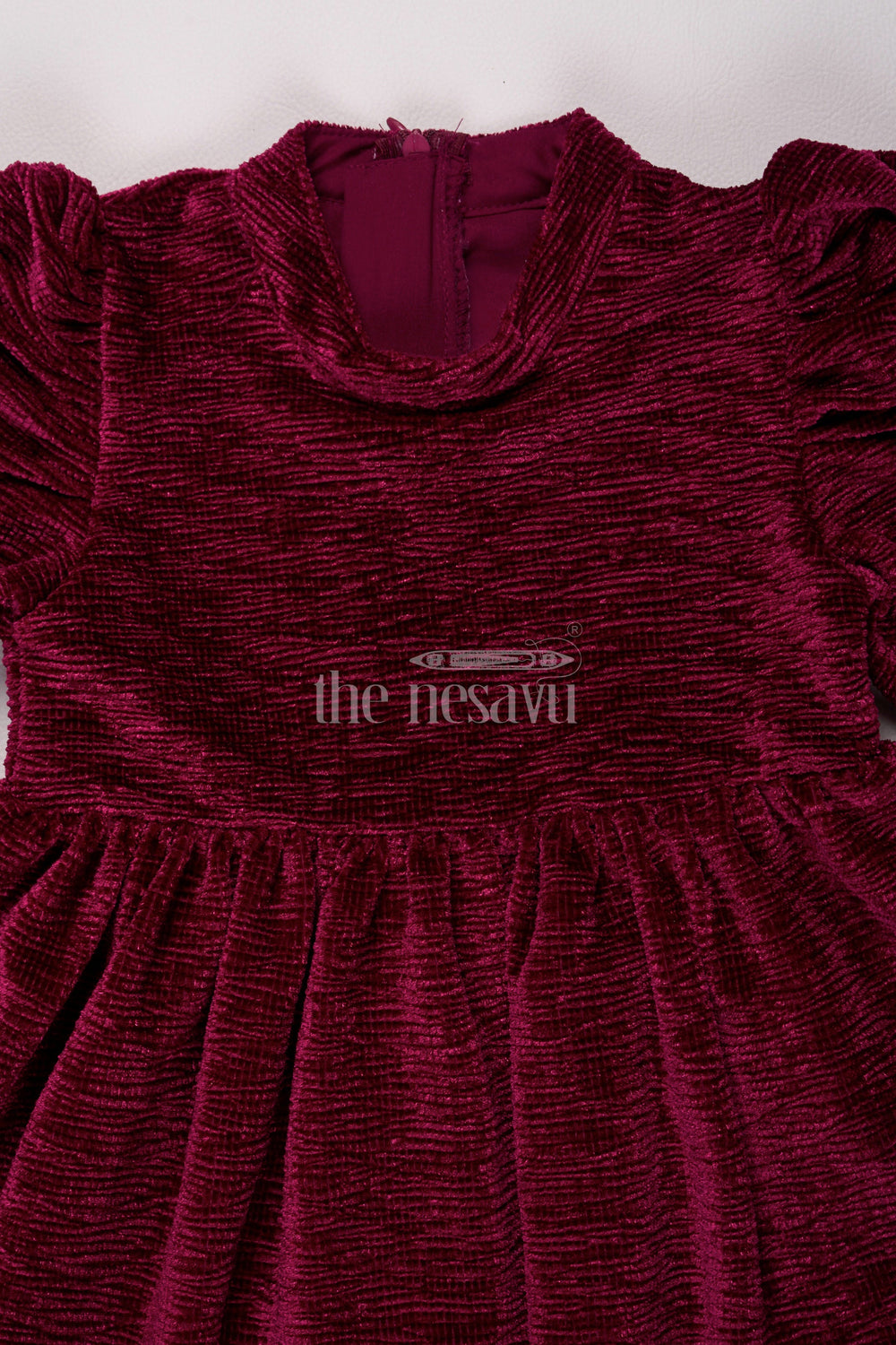 The Nesavu Baby Fancy Frock Maroon Glaze Organza Baby Fancy Frock with 3/4 Sleeves and Pleated Skirt for Girls Casual and Festive Wear Nesavu Nesavu Maroon Baby Fancy Frock Velvet Texture 34 Sleeves Girls Winter Fashion