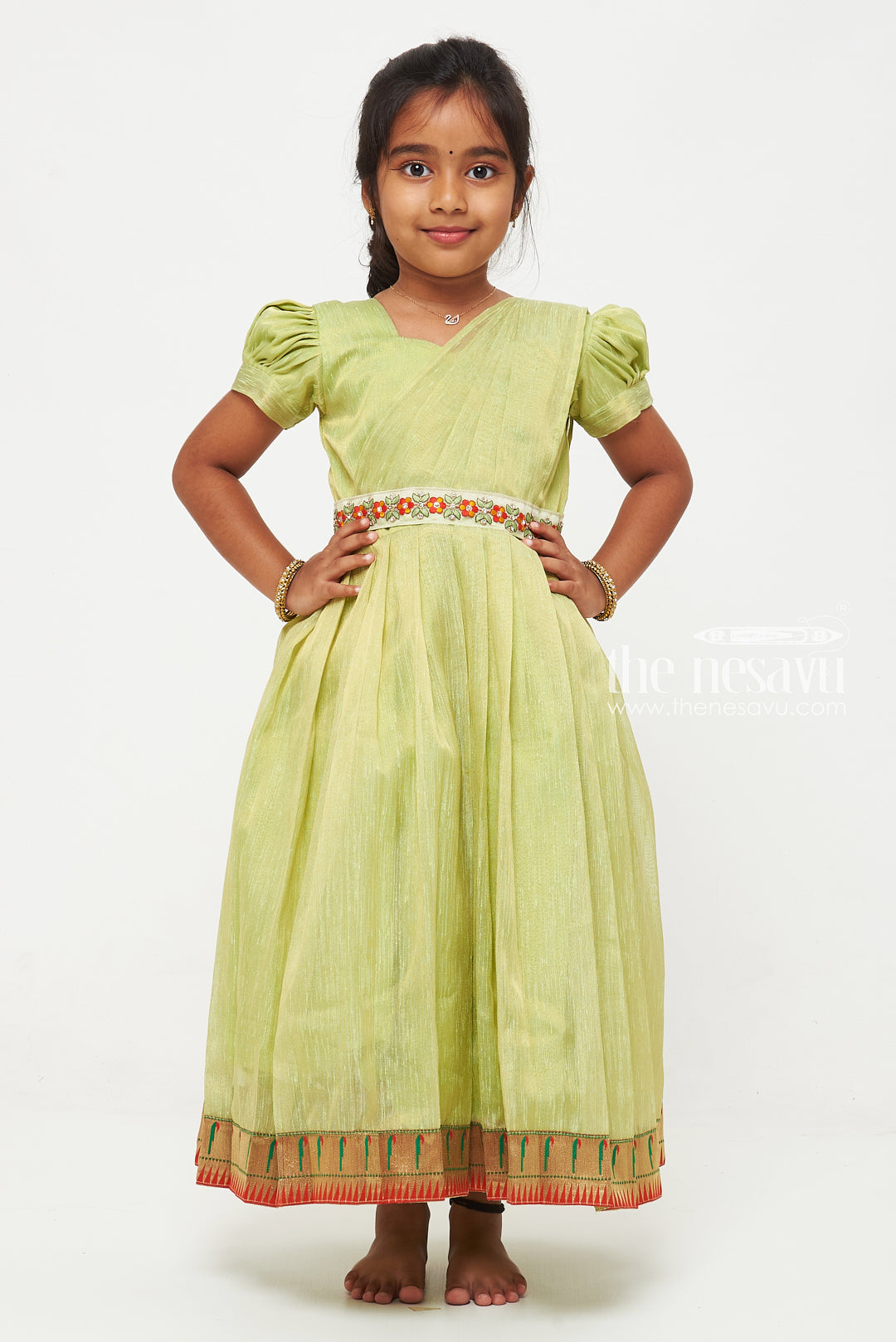 The Nesavu Girls Silk Gown Parrot Green Tissue Fabric Saree Gown for Girls with Embroidered Hip Belt Nesavu