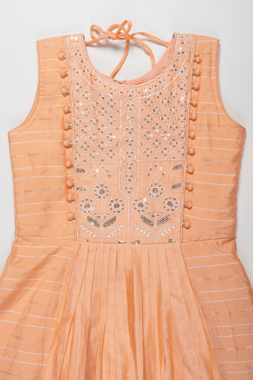 The Nesavu Girls Silk Gown Peach Embroidered Sleeveless Silk Frock with Dupatta for Girls - Elegant Traditional Wear Nesavu Girls Peach Embroidered Sleeveless Silk Frock with Dupatta | Elegant Traditional Wear | The Nesavu