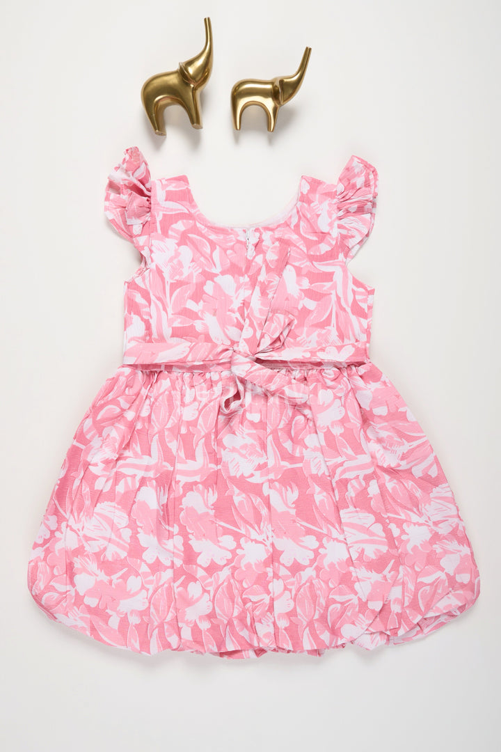 The Nesavu Girls Fancy Frock Pink Blended Cotton Girls Fancy Frock with Floral Print and Ruffle Sleeves Nesavu Nesavu Pink Floral Girls Fancy Frock Ruffle Sleeves Cotton Blend Fabric