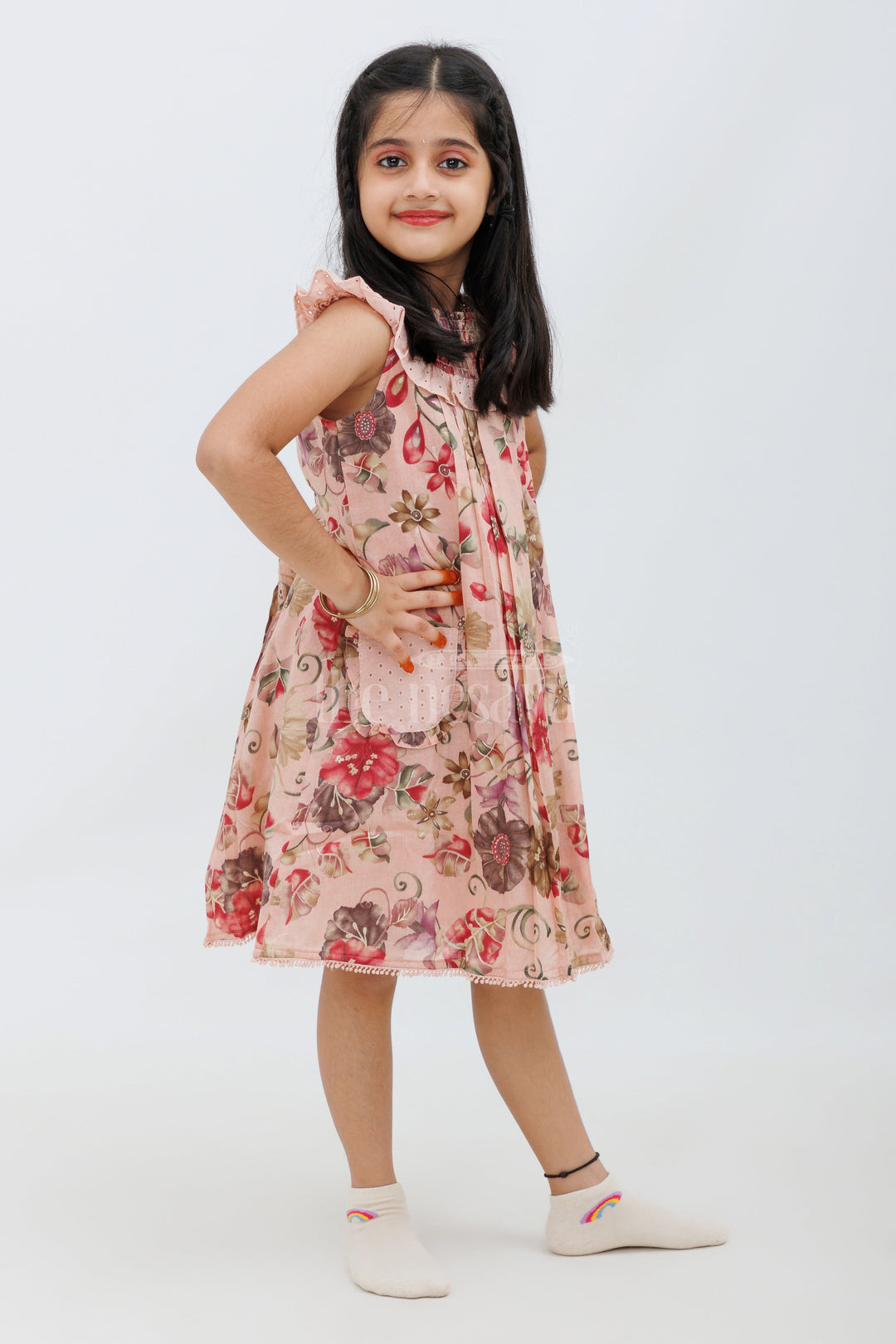 The Nesavu Girls Fancy Frock Pink Floral Cotton Frock with Smocked Neckline and Pockets Nesavu Pink Floral Cotton Frock with Smocked Neckline - Nesavu