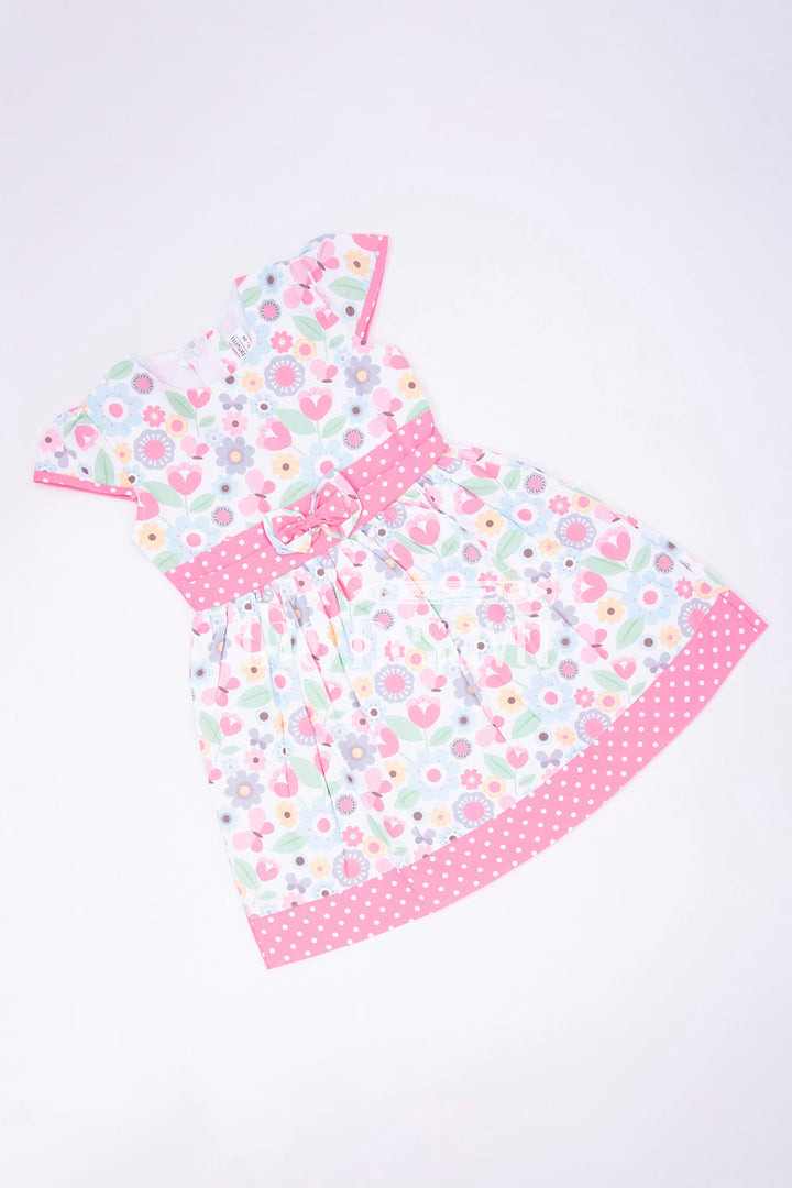 The Nesavu Girls Fancy Frock Pink Polka Dot and Floral Frock with Bow Embellishment Nesavu Pink Polka Dot and Floral Frock with Bow Embellishment for Girls - Nesavu