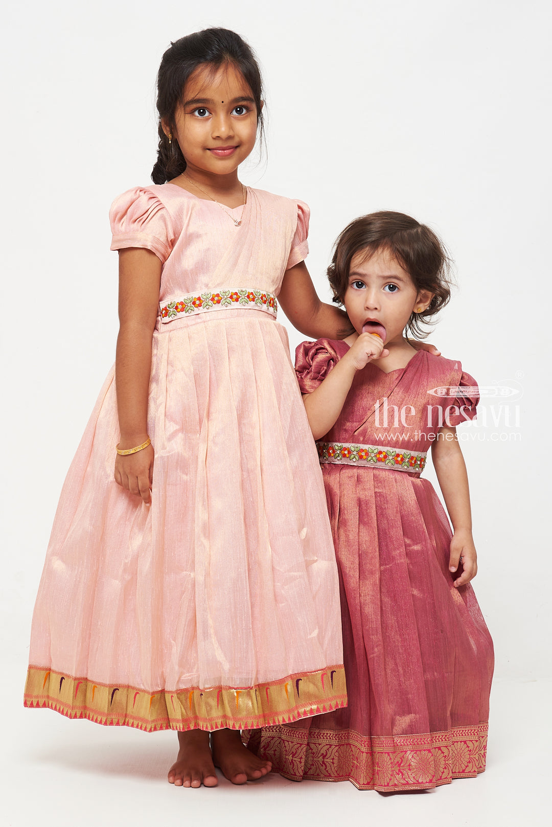 The Nesavu Girls Silk Gown Pink Tissue Fabric Saree Gown for Girls with Embroidered Hip Belt Nesavu