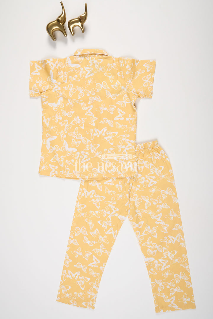 The Nesavu Night Dress Pure Cotton Unisex Nightsuit with Butterfly Print in Yellow for Toddlers Nesavu Pure Cotton Unisex Nightsuit with Butterfly Print in Yellow for Toddlers Nesavu