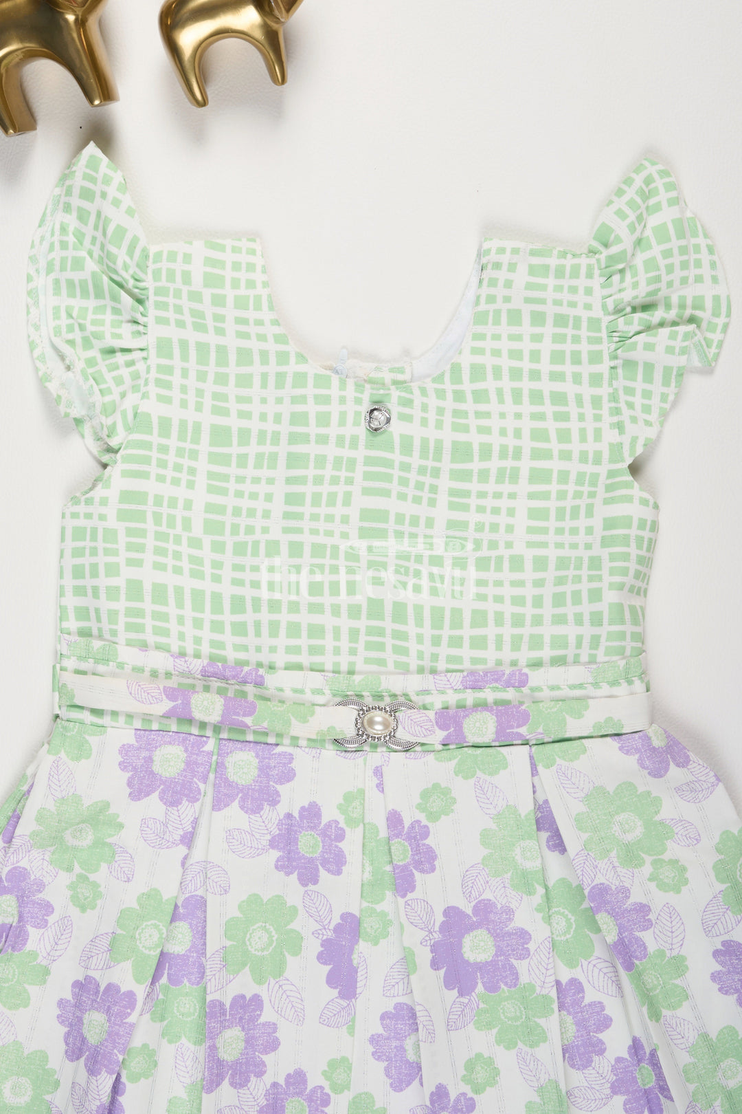 The Nesavu Girls Cotton Frock Purple and Green Floral Checked Cotton Frock with Pleated Skirt for Girls Nesavu Purple and Green Floral Checked Cotton Frock with Pleated Skirt for Girls Nesavu