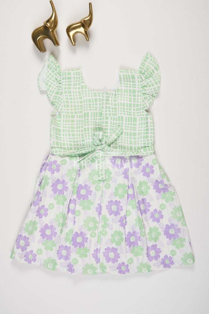 The Nesavu Girls Cotton Frock Purple and Green Floral Checked Cotton Frock with Pleated Skirt for Girls Nesavu Purple and Green Floral Checked Cotton Frock with Pleated Skirt for Girls Nesavu