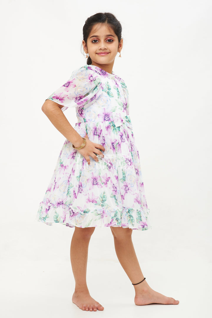 The Nesavu Girls Fancy Frock Purple Floral Georgette Printed Frock with Pleated Skirt and Puff Sleeves for Girls Nesavu