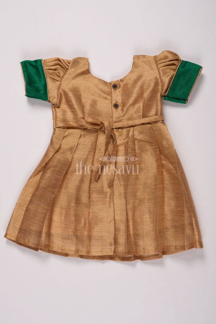 The Nesavu Silk Frock Radiant Gold Long Frock Pattu for Girls with Green Bib Yoke and Silver Tissue Fabric Nesavu Nesavus Gold Long Frock Pattu Girls Silver Tissue Green Yoke