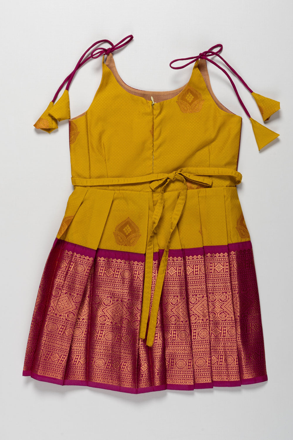 The Nesavu Tie-up Frock Radiant Silk Knot-Tie Frock for Namakarana and Karnavedha: Diverse and Bold Color Combinations Nesavu Stylish Maroon and Gold Silk Dresses for Kids | Unique Party Wear with Adjustable Ties | The Nesavu