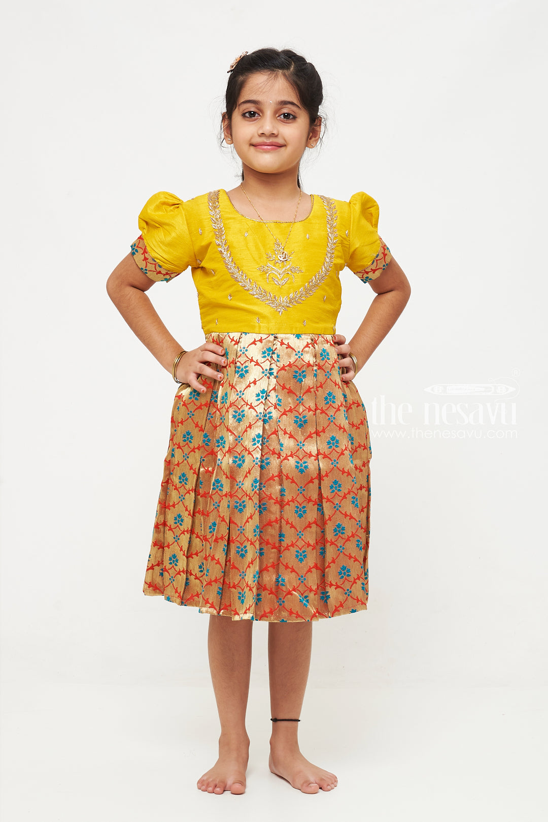 The Nesavu Silk Party Frock Radiant Yellow and Gold Pattu Silk Frock: Exquisite Floral Banarasi Design with Intricate Embroidery for Girls Nesavu Yellow and Gold Pattu Silk Frock | Exquisite Floral Banarasi Design | Festive Wear for Girls | The Nesavu