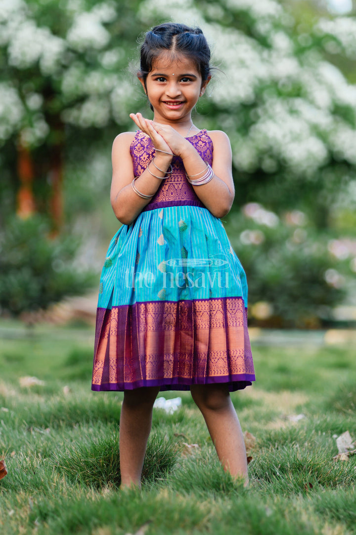 The Nesavu Girls Kanchi Silk Frock Royal Festive Attire for Little Ones: Purple and Green Kanji Border Silk Frock Nesavu Royal Festive Attire for Little Ones: Purple and Green Kanji Border Silk Frock