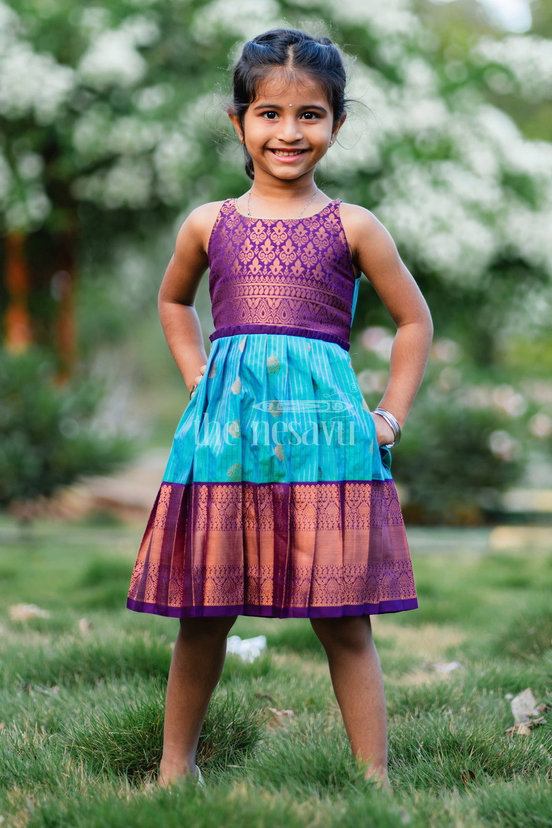 The Nesavu Girls Kanchi Silk Frock Royal Festive Attire for Little Ones: Purple and Green Kanji Border Silk Frock Nesavu Royal Festive Attire for Little Ones: Purple and Green Kanji Border Silk Frock