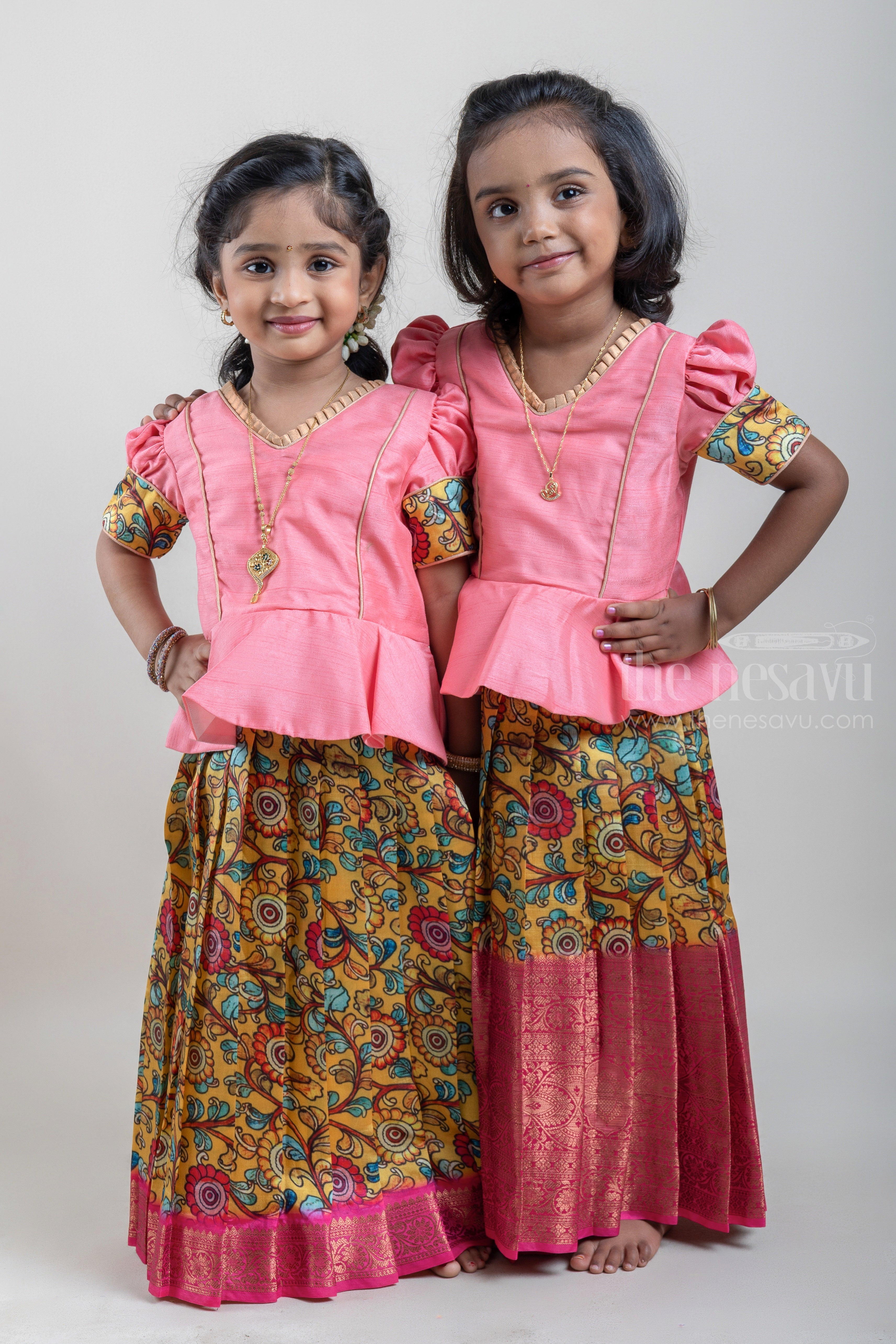 Salmon Pink and Yellow Silk Pattu Pavadai for Girls at The Nesavu Traditional Indian Outfit