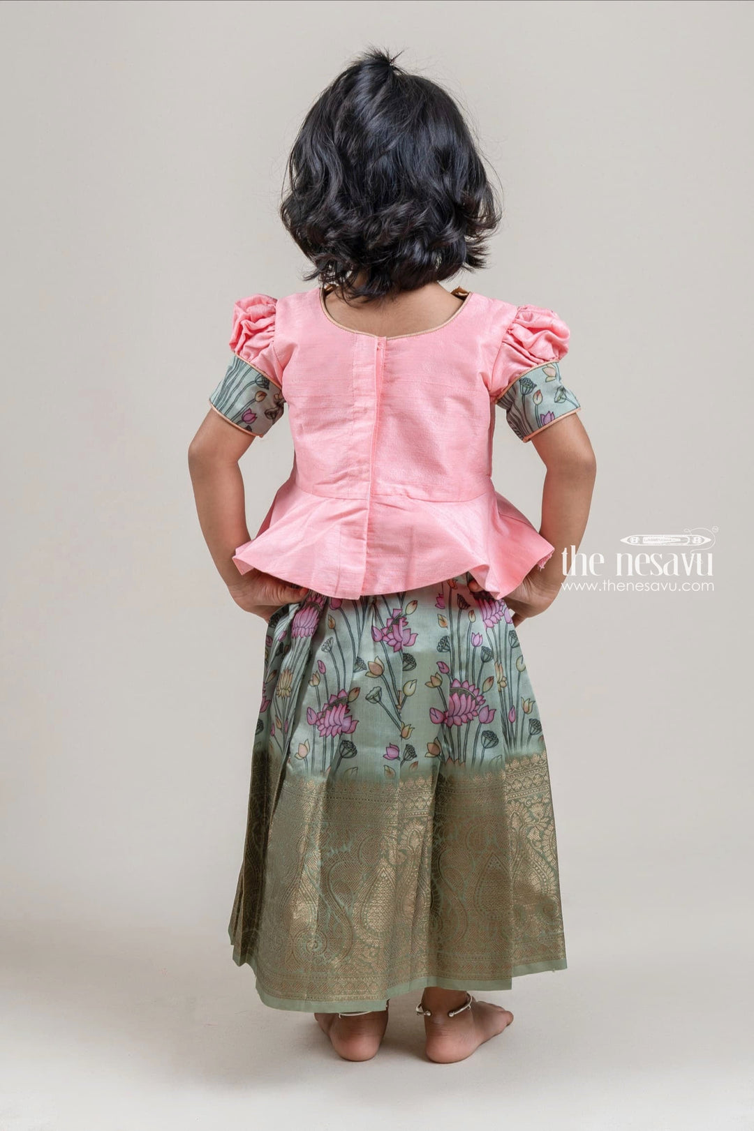 The Nesavu Pattu Pavadai Salmon Pink Silk Blouse N Green Floral Printed Pattu Pavadai for Girls Nesavu Premium Pattu pavadai |Banarasi Border for Girls | The Nesavu