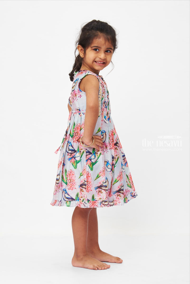 The Nesavu Girls Cotton Frock Serenade of Spring Dress: Sleeveless Bird & Bloom Print Frock for Girls Nesavu Girls Spring Bird Print Lace Dress | Grey Floral Frock | Playful Ruffled Hem | The Nesavu