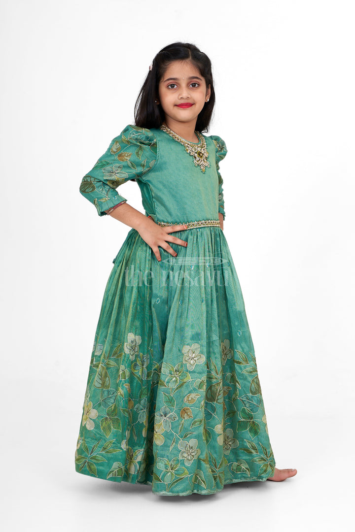 The Nesavu Girls Party Gown Shimmer Tissue Printed Girls Party Gown with Floral Motif for Evening Events and Celebrations Nesavu Nesavu Shimmer Tissue Green Girls Evening Gown Floral Print Ideal Special Celebrations Family Gatherings