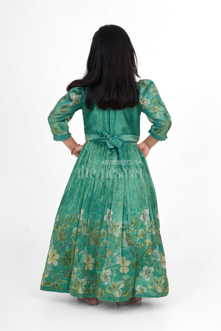 The Nesavu Girls Party Gown Shimmer Tissue Printed Girls Party Gown with Floral Motif for Evening Events and Celebrations Nesavu Nesavu Shimmer Tissue Green Girls Evening Gown Floral Print Ideal Special Celebrations Family Gatherings