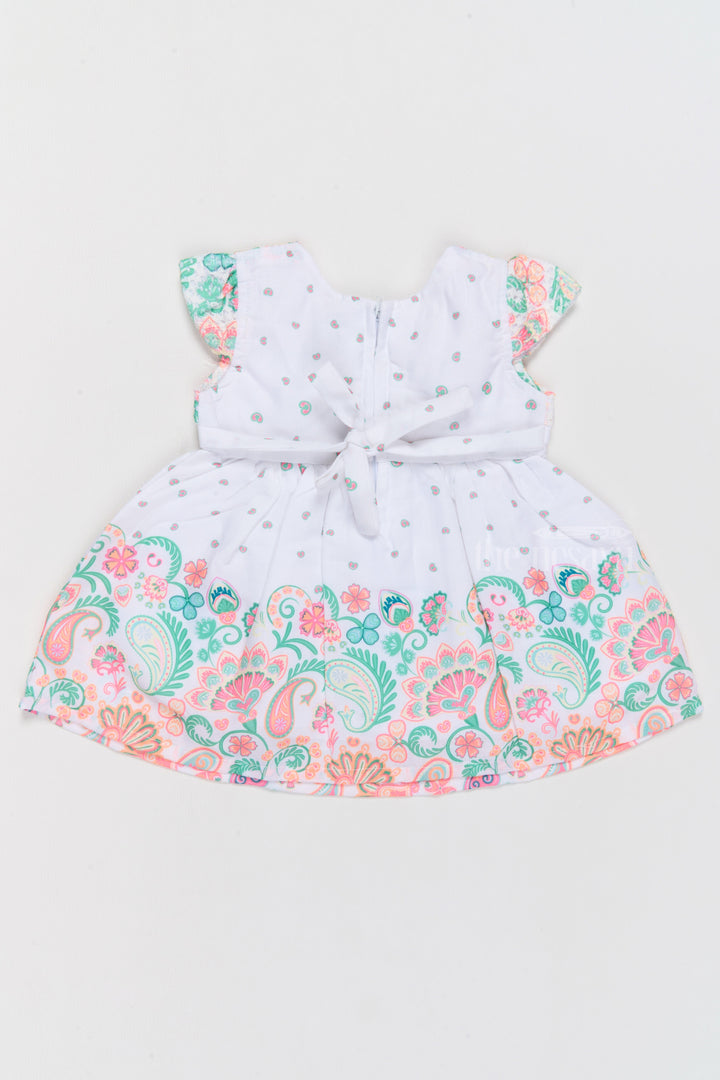 The Nesavu Baby Cotton Frocks Short Frock Cotton for Girls with Vibrant Paisley Prints and Decorative Bow Nesavu Nesavu Short Frock Cotton Girls Paisley Prints Bow Detail  Perfect Family Gatherings