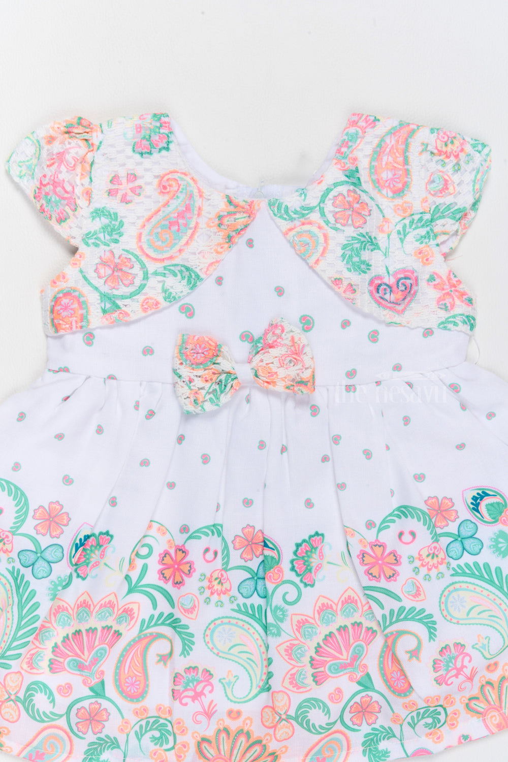 The Nesavu Baby Cotton Frocks Short Frock Cotton for Girls with Vibrant Paisley Prints and Decorative Bow Nesavu Nesavu Short Frock Cotton Girls Paisley Prints Bow Detail  Perfect Family Gatherings