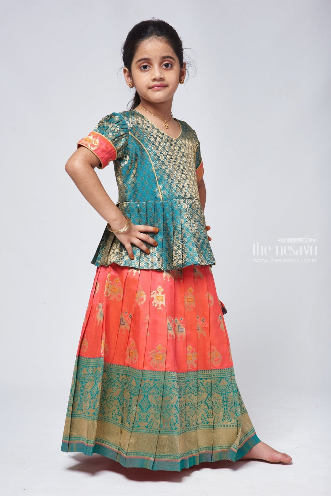 The Nesavu Pattu Pavadai Stylish Brocade Green Peplum Blouse with Zari Animal Motif Kanchi Border Pattu Langa: South Indian Elegan Nesavu Animal Motif Pattu Langa | Pattu Pavadai Blouse Designs | The Nesavu