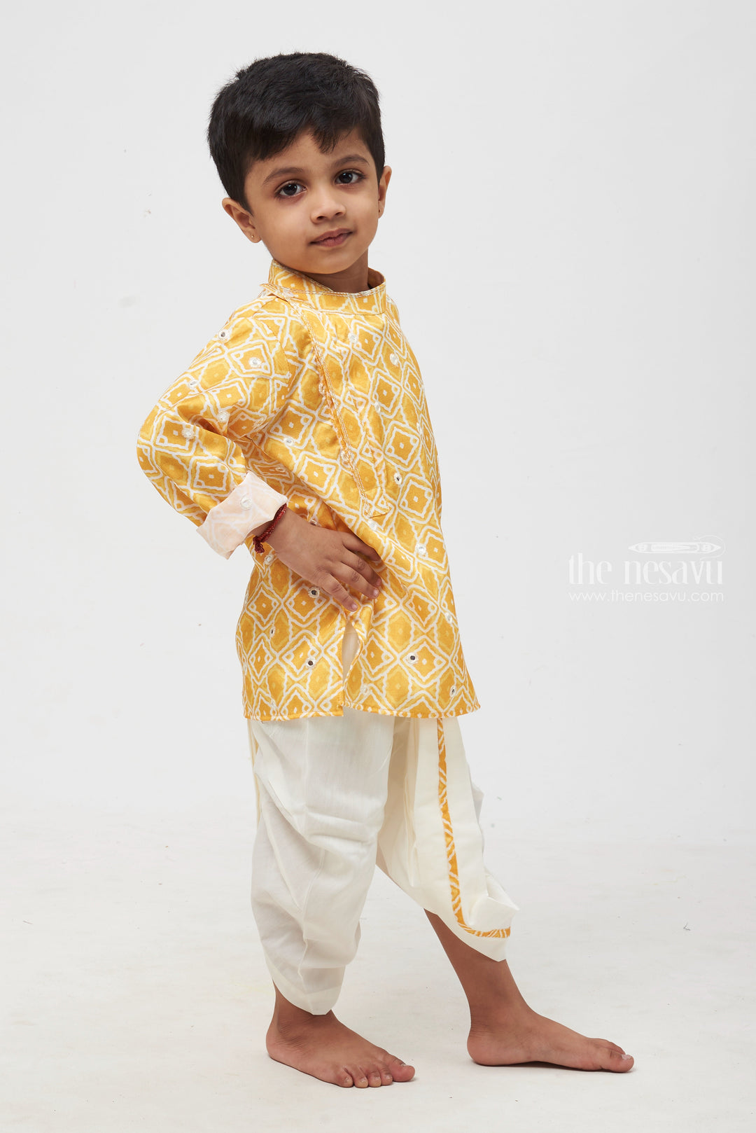 The Nesavu Boys Dothi Set Sunlit Gold: Mirror-Embroidered Geometric Printed Yellow Kurta & Panjagacham Set for Boys Nesavu Boys Festive Kurta Dhoti Sets | Exclusive Indian Festive Wear | The Nesavu