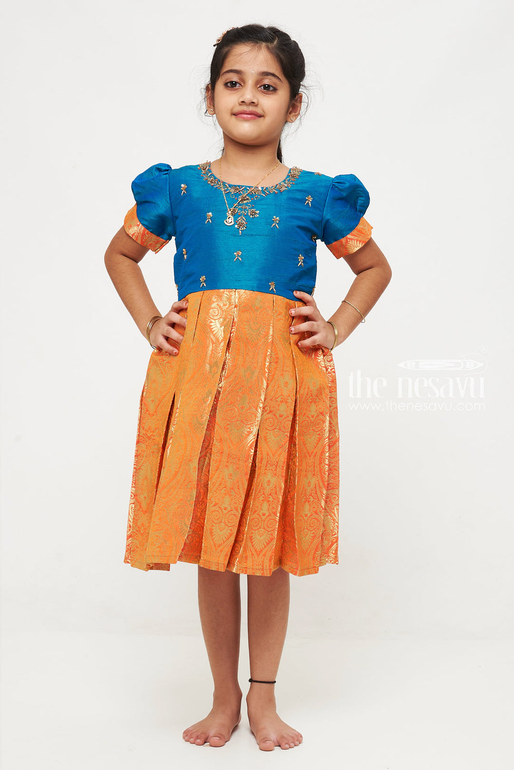 The Nesavu Silk Party Frock Teal and Orange Banarasi Semi-Silk Dress for Girls - Ideal for Festive Occasions Nesavu Teal and Orange Banarasi Semi-Silk Dress for Girls - Festive Wear