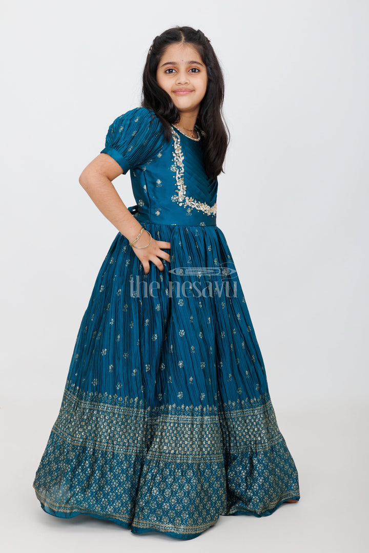 The Nesavu Girls Silk Gown Teal Girls Grand Silk Gown with Puff Sleeves and Foil Print for Special Functions Nesavu 24 (5Y) / Teal GA275B-24 Nesavu Teal Girls Silk Gown Puff Sleeves Gold Embroidery Grand Occasions