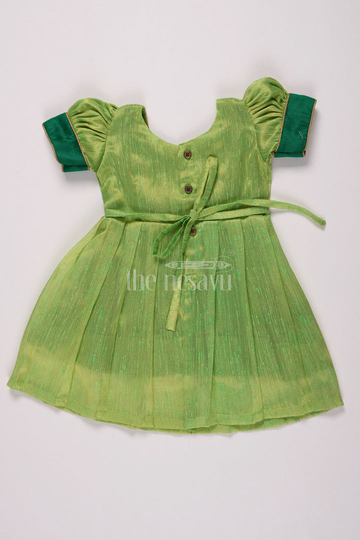 The Nesavu Silk Frock Traditional Light Green and Navy Pattu Long Frocks Designs for Girls in Silver Tissue Nesavu Nesavus Light Green Navy Pattu Long Frocks Designs Girls Silver Tissue Details