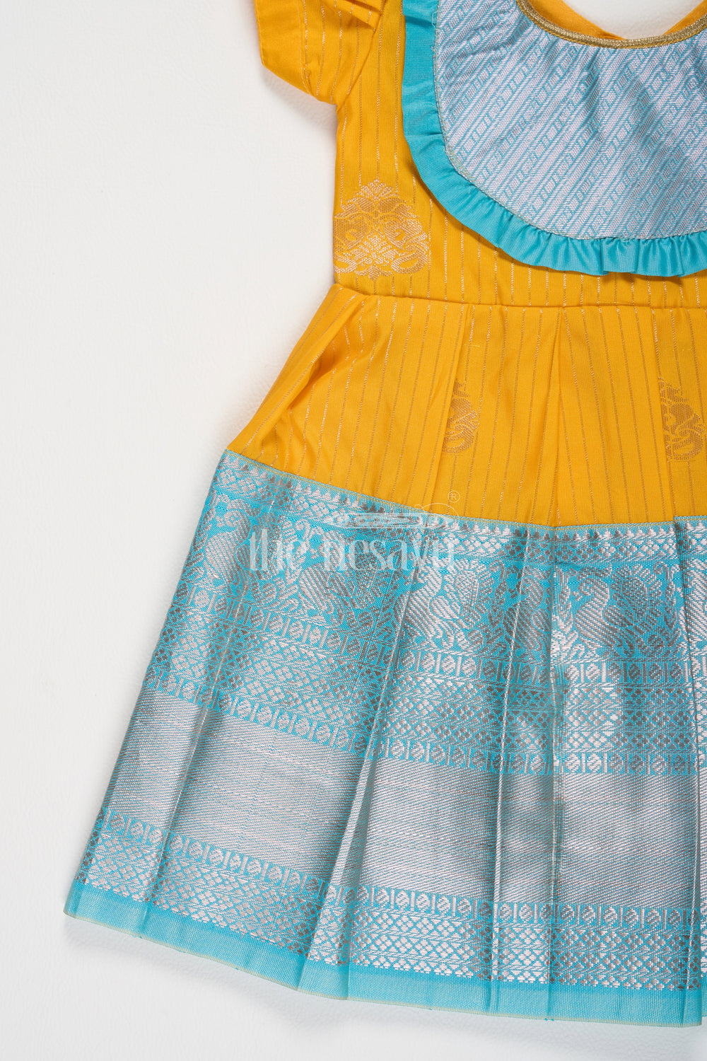 The Nesavu Girls Kanchi Silk Frock Traditional Semi Kanchivaram Silk Frock for Girls with Blue Border and Puff Sleeves Nesavu Nesavu Girls Semi Kanchivaram Silk Frock Blue Border Puff Sleeves Special Occasions