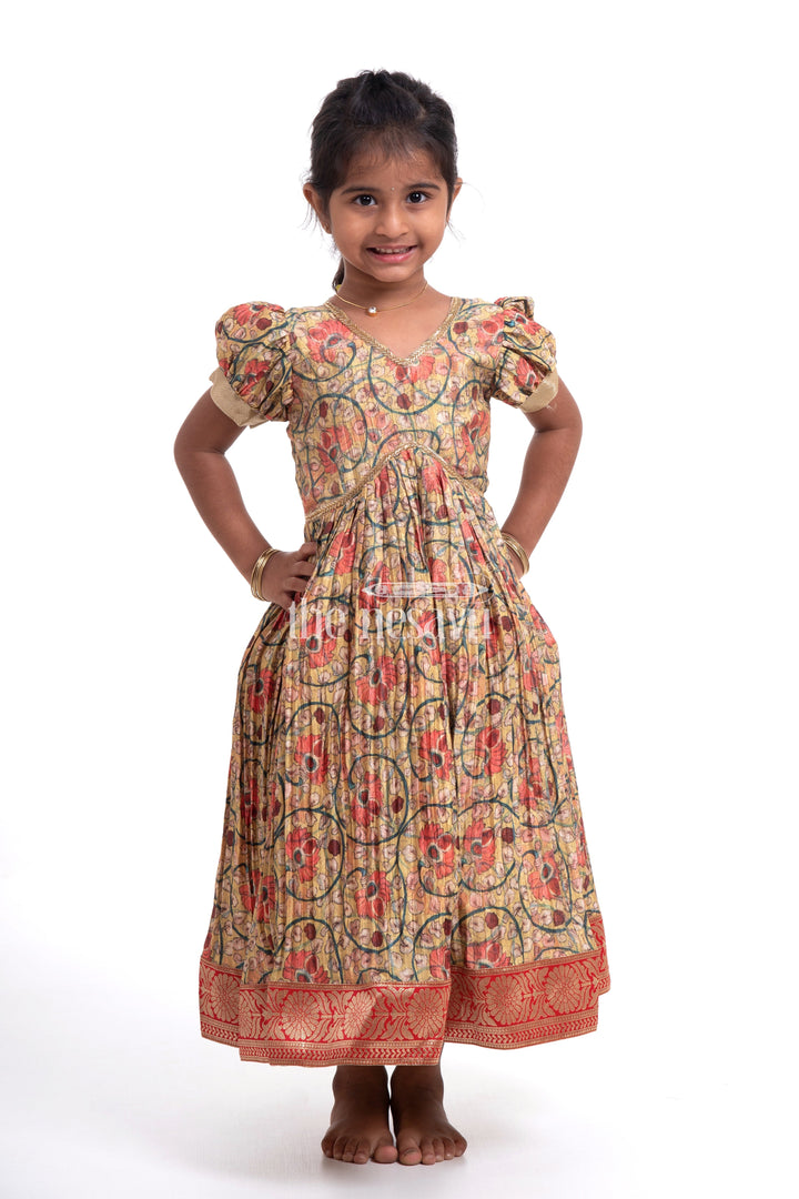 The Nesavu Girls Silk Gown Traditional Yellow Kalamkari Chinon Party Gown for Girls Nesavu Traditional Yellow Kalamkari Chinon Party Gown for Girls - Festive Attire