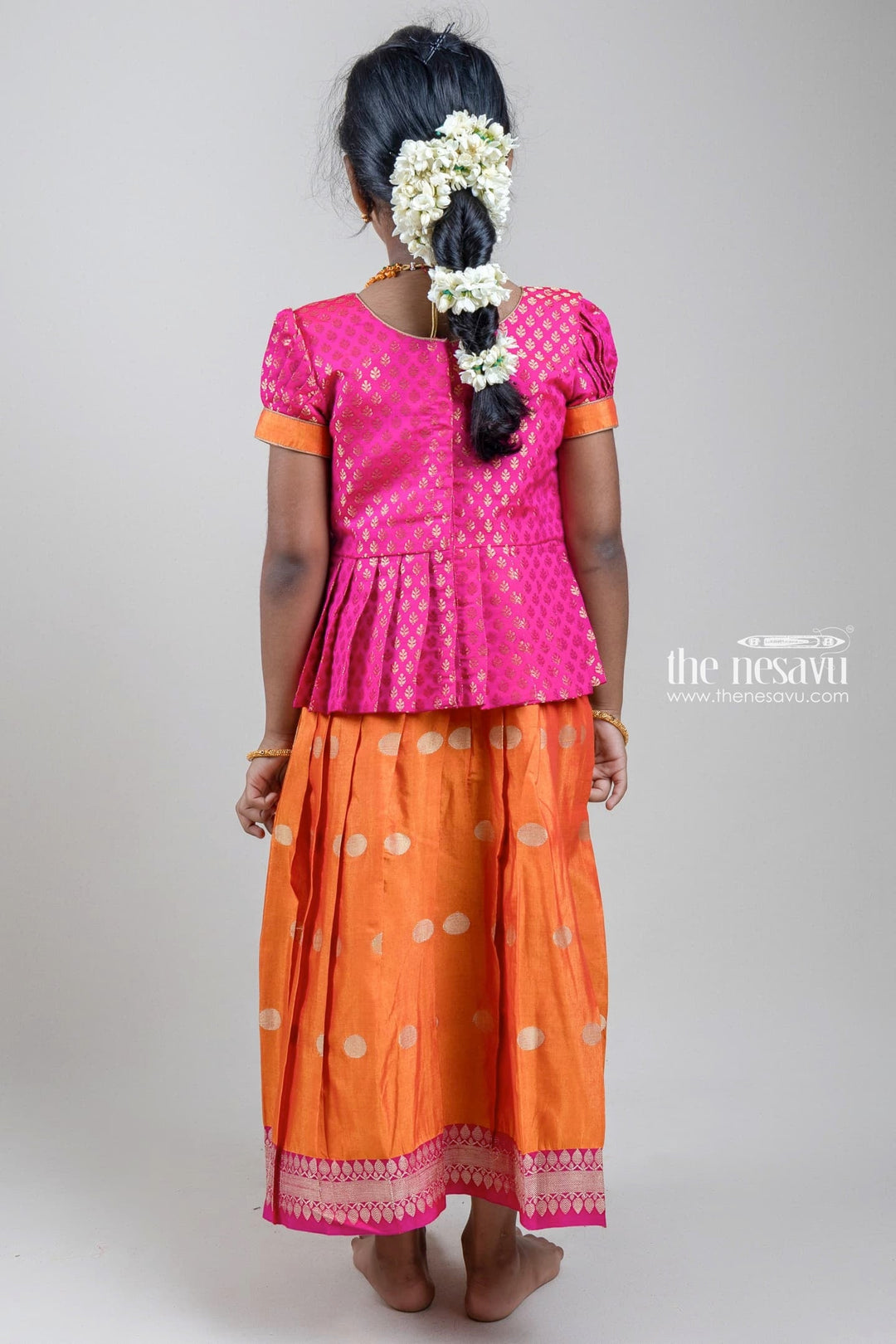 The Nesavu Pattu Pavadai Traditional Zari Brocade Printed Pink Silk Peplum Blouse with Knife Pleated Yellow Silk Skirt for Girls GPP265B Nesavu Zari Brocade Printed Pink Silk Peplum Blouse with Knife Pleated Yellow Silk Skirt for Girls | Shop at The Nesavu