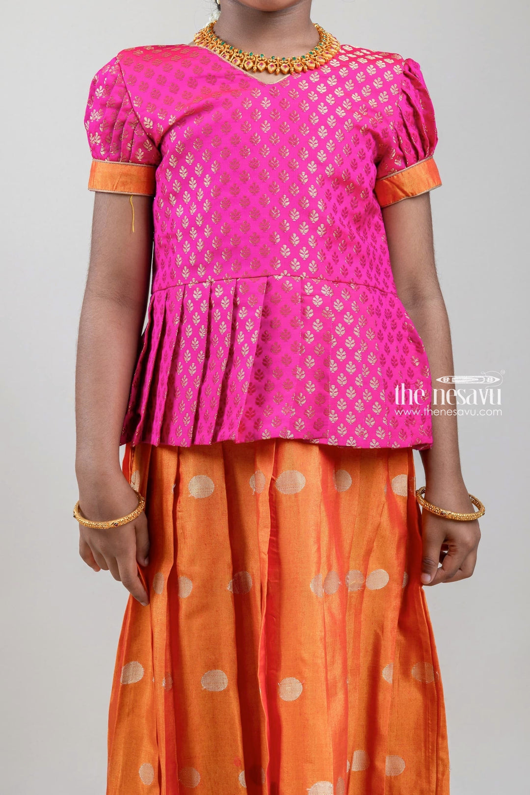 The Nesavu Pattu Pavadai Traditional Zari Brocade Printed Pink Silk Peplum Blouse with Knife Pleated Yellow Silk Skirt for Girls GPP265B Nesavu Zari Brocade Printed Pink Silk Peplum Blouse with Knife Pleated Yellow Silk Skirt for Girls | Shop at The Nesavu