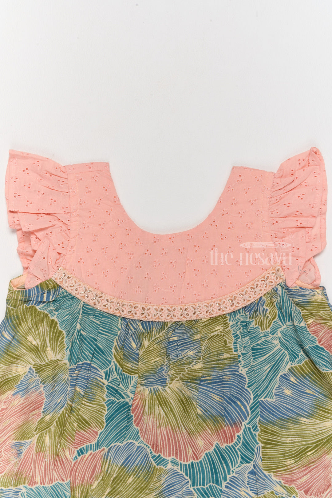 The Nesavu Girls Cotton Frock Trendy Girls Cotton New Dress with Vibrant Leaf Print and Lace Yoke Nesavu Nesavu Girls Cotton New Dress Bold Leaf Print Flutter Sleeves Lace Detailing