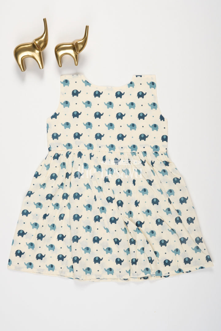 The Nesavu Baby Cotton Frocks Turquoise Elephant Motif Baby Cotton Frock with Mockwrap Neckline and Button Detail Nesavu Turquoise Elephant Motif Baby Cotton Frock with Mockwrap Neckline and Button Detail Nesavu