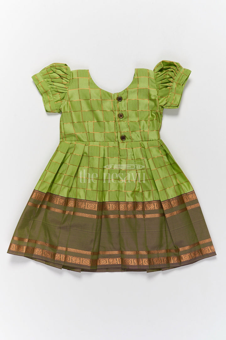 The Nesavu Girls Kanchi Silk Frock Vibrant Green Pattu Long Frock for Girls with Golden Checkered Pattern and Ruffled Yoke Nesavu Nesavus Green Pattu Long Frock Girls Golden Checkered Blend Silk Detailing