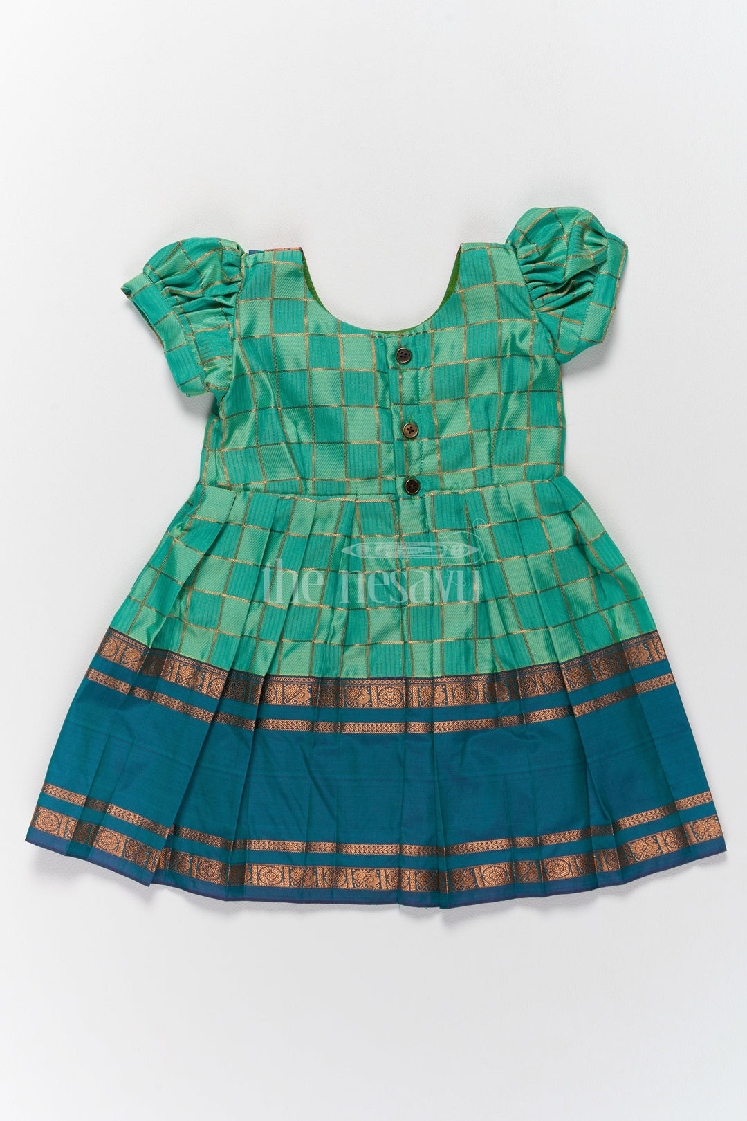 The Nesavu Girls Kanchi Silk Frock Vibrant Green Pattu Long Frock for Girls with Golden Checkered Pattern and Ruffled Yoke Nesavu Nesavus Green Pattu Long Frock Girls Golden Checkered Blend Silk Detailing