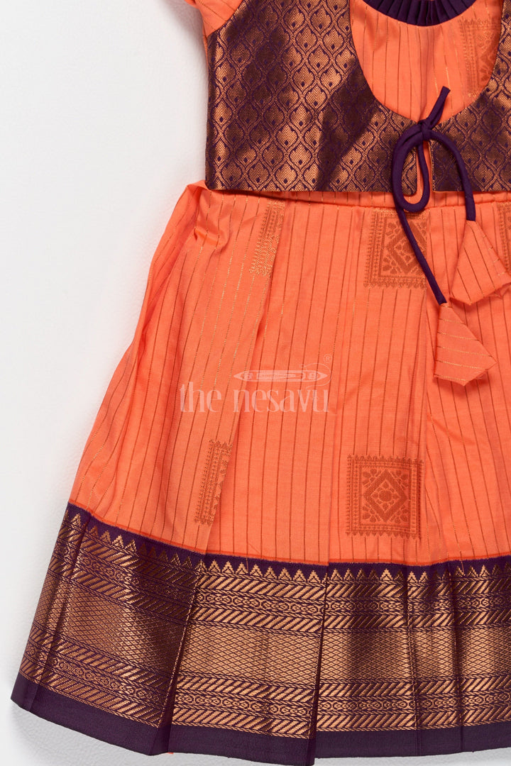 The Nesavu Girls Kanchi Silk Frock Vibrant Orange Girls Kanchi Simple Silk Frock with Intricate Gold Zari Borders Nesavu Traditional Orange Simple Kanchi Silk Frock Zari Borders Girls Nesavu