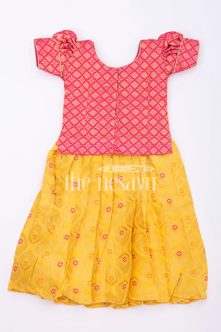 The Nesavu Pattu Pavadai Vibrant Pink and Yellow Silk Pattu Pavadai for Kids Nesavu Pink and Yellow Silk Pattu Pavadai for Kids - Festive Traditional Wear