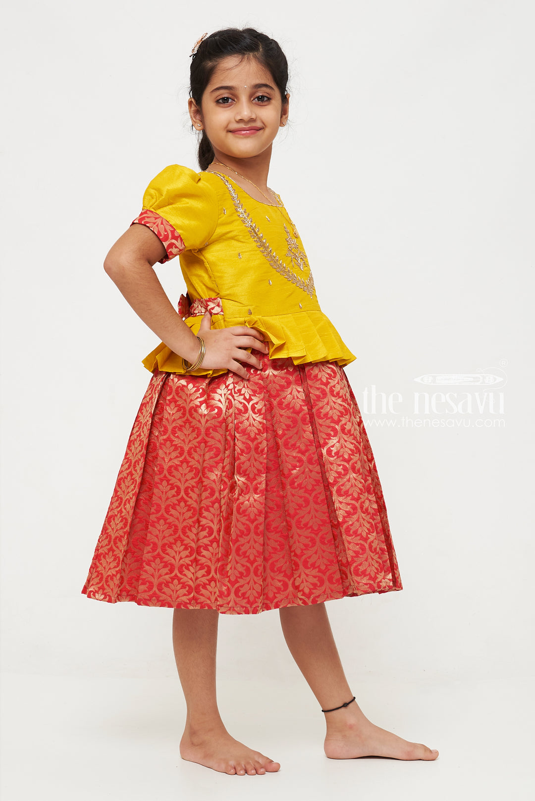 The Nesavu Silk Party Frock Vibrant Yellow and Red Pattu Silk Frock: Exquisite Gold Embroidery with Floral Banarasi Pattern for Girls Nesavu Yellow and Red Pattu Silk Frock | Gold Floral Banarasi Pattern | Traditional Festive Wear for Girls | The Nesavu